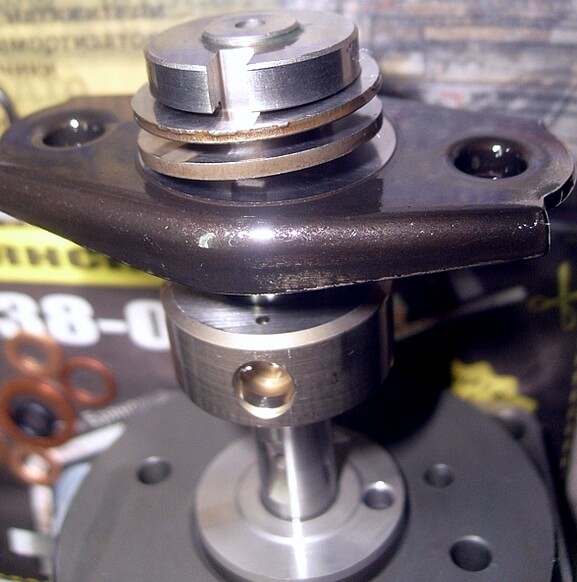 Расположение шайб и отверстия в дозаторе Шайбы в дозаторе