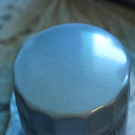 Масляный фильтр VAG 03C 115 561 H при дневном свете